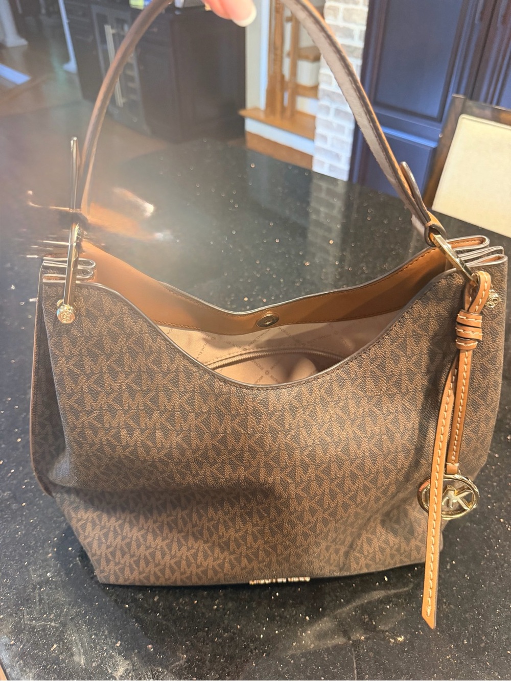 Like new Michael Kors Large Brown Signature MK Hobo Shoulder Bag with Gold Charm